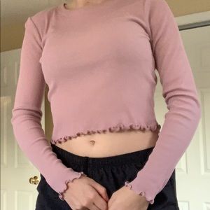 A dusty rose long sleeve shirt